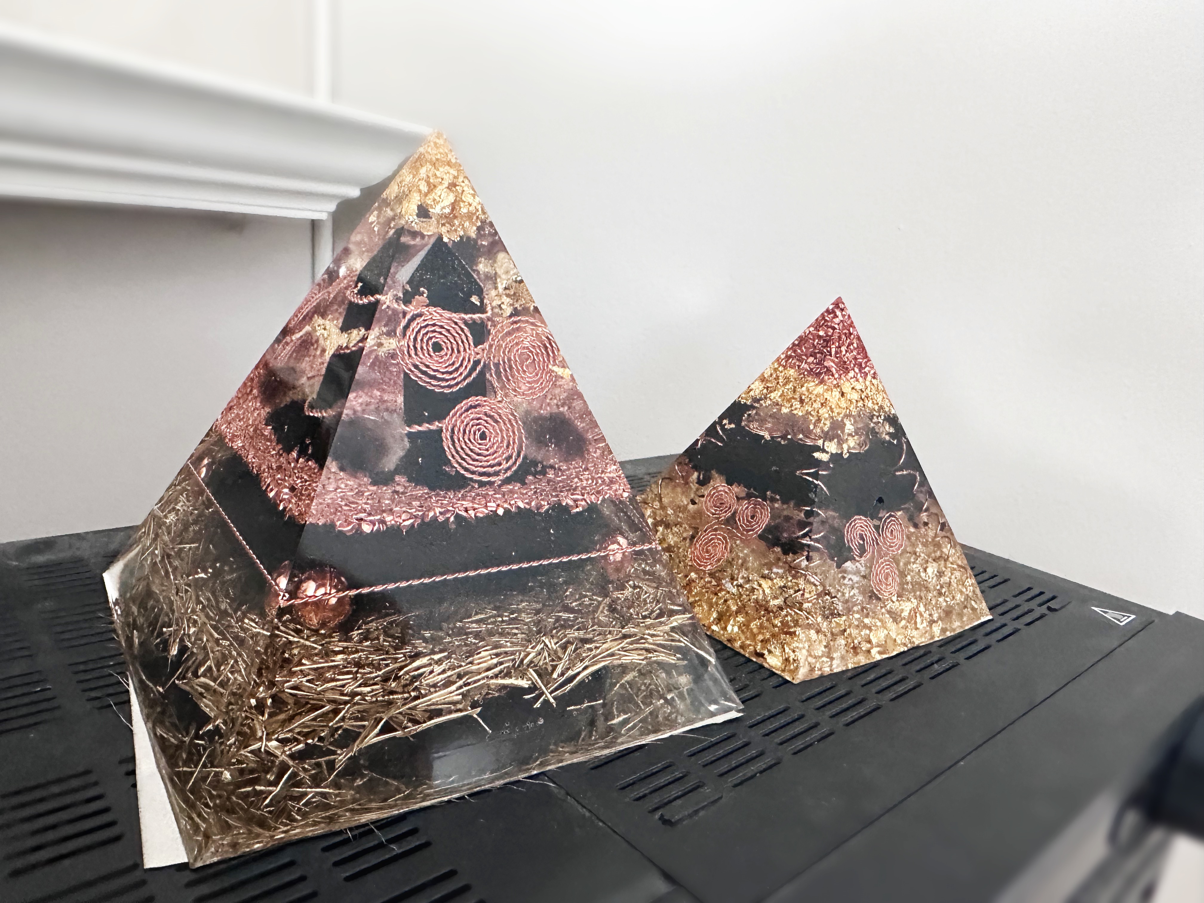 Handcrafted orgonite pyramid with embedded crystals