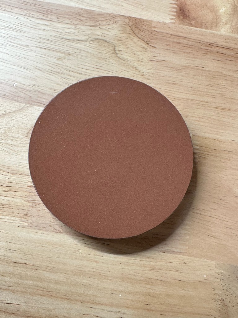 Copper back shared by all Triskel Series coasters